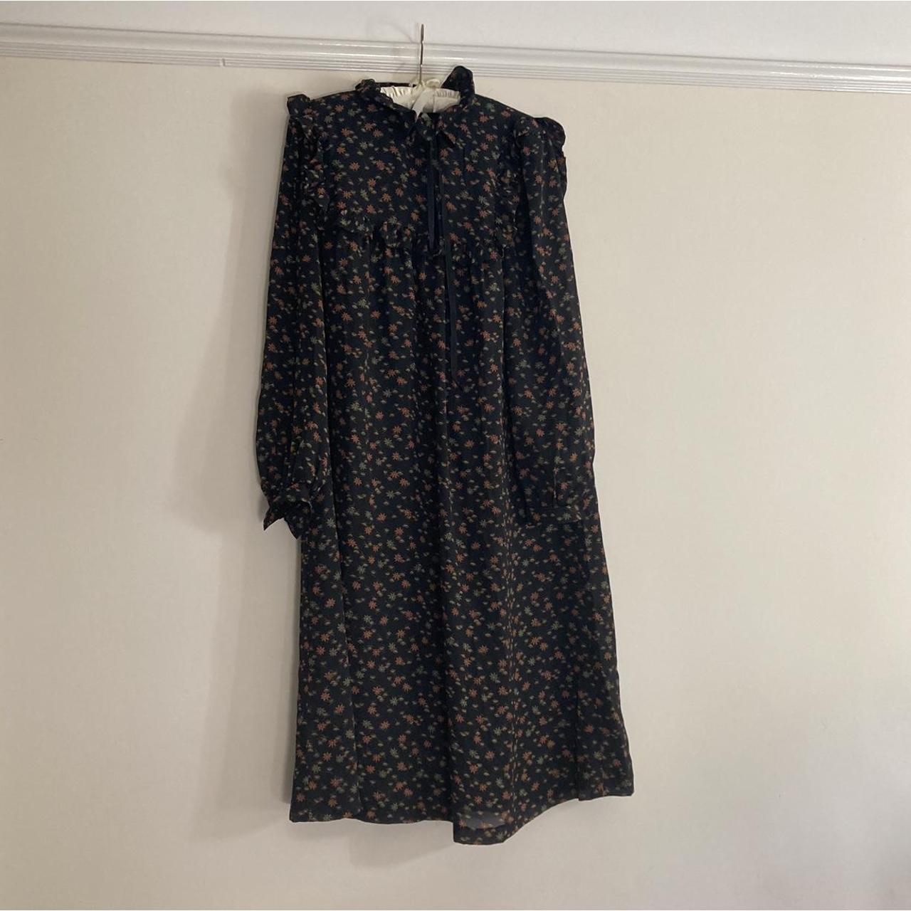 Lovely black patterned smock dress with tie detail Depop