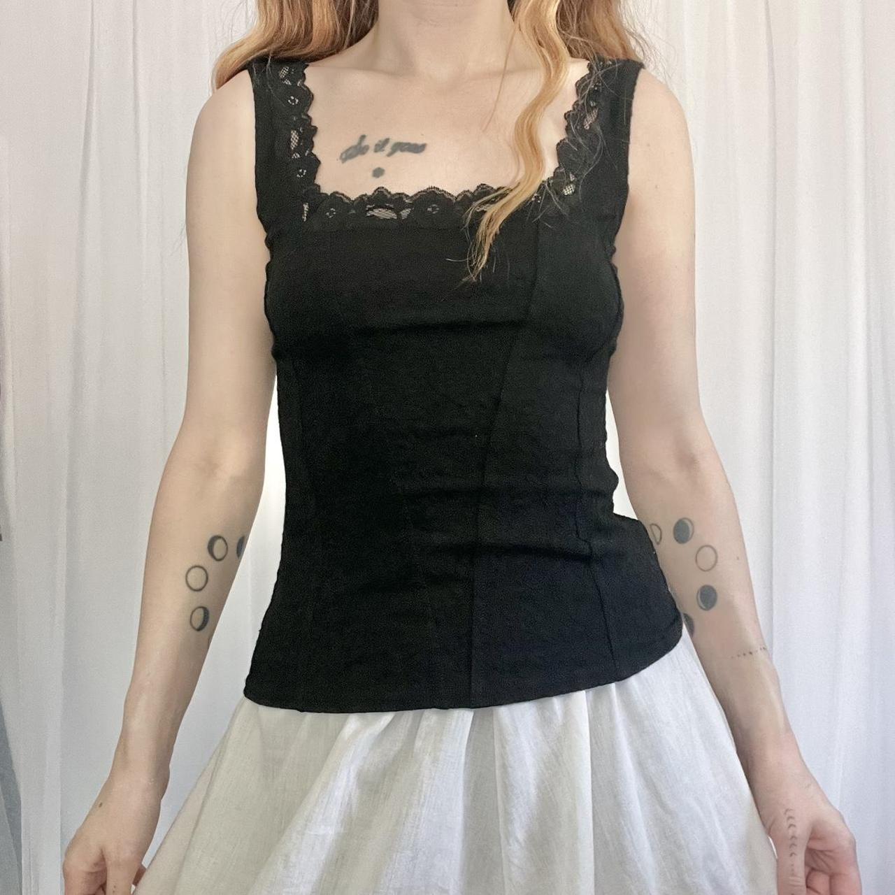 Black corset style cami. Black cami with lace trim... - Depop