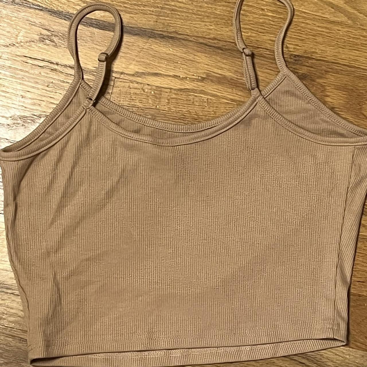 tan cropped tank, it's a large but fits more like a... - Depop
