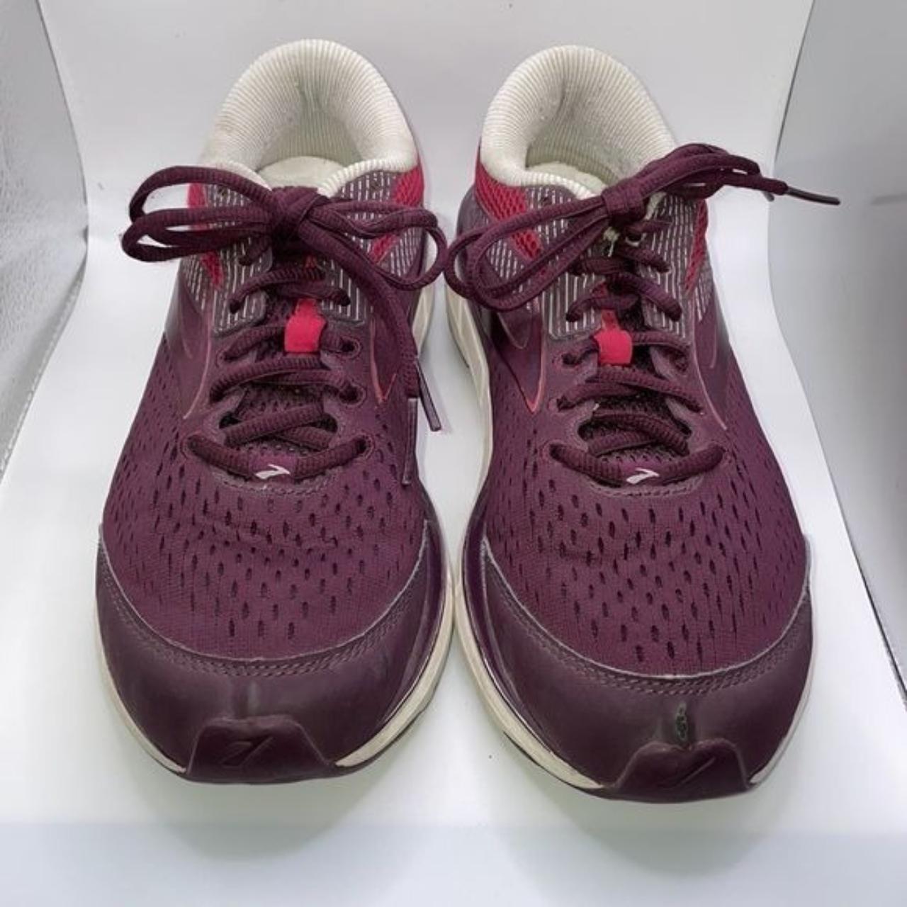pink and purple running shoes