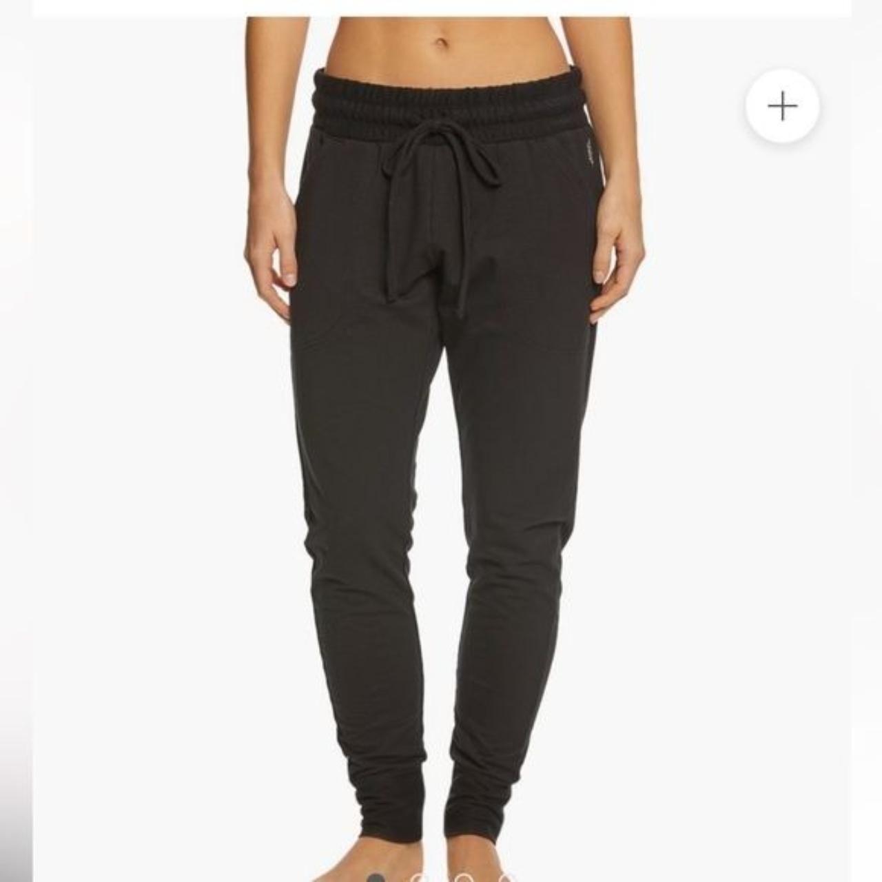 Black skinny sweatpants with elastic waist around... Depop