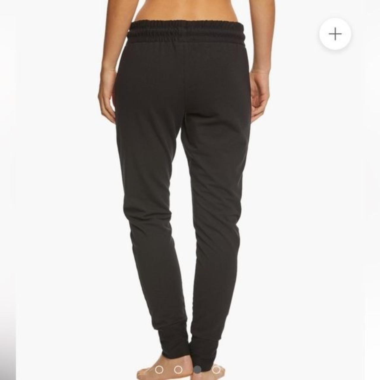 Black skinny sweatpants with elastic waist around... Depop