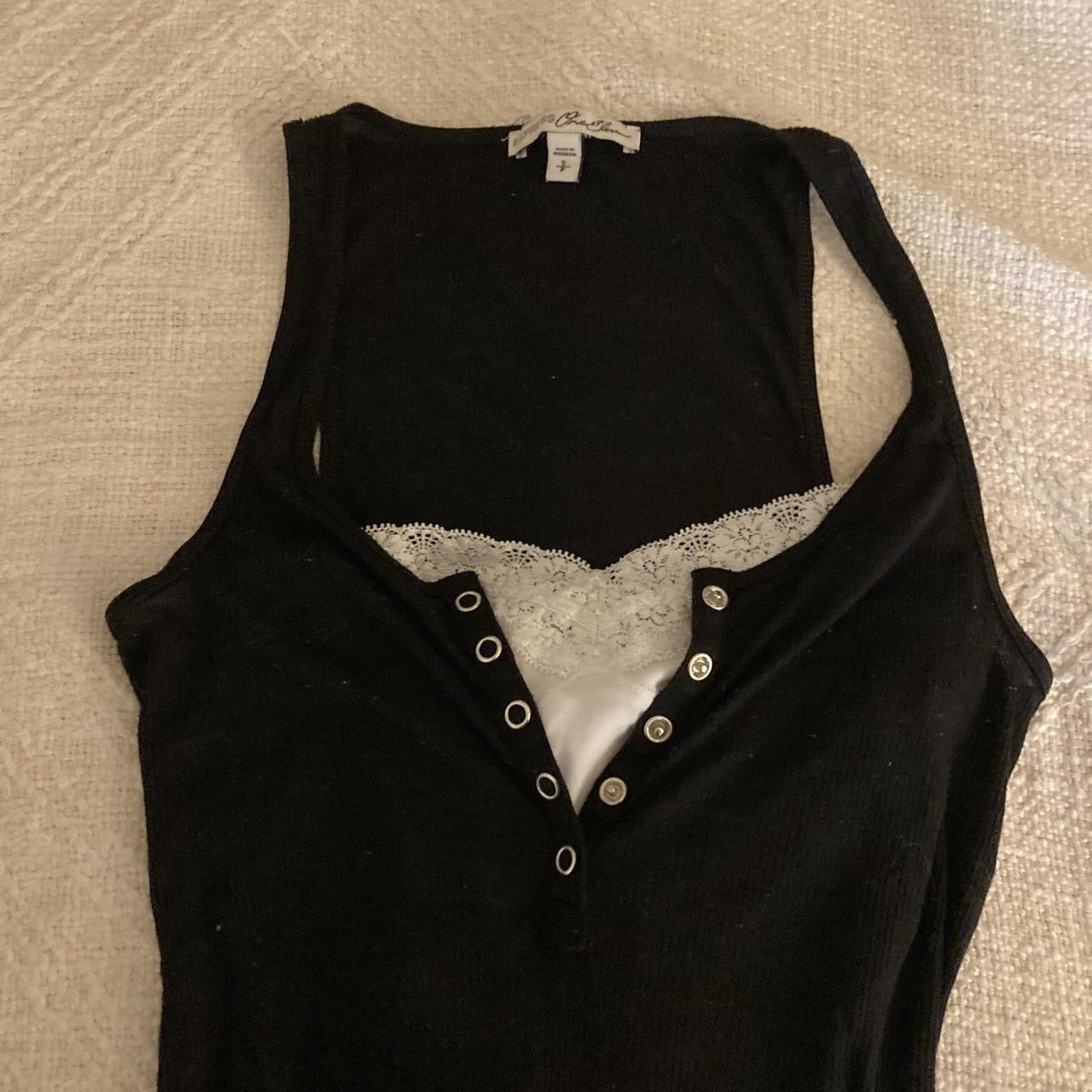 Black henley tank top featuring button up detail +... Depop