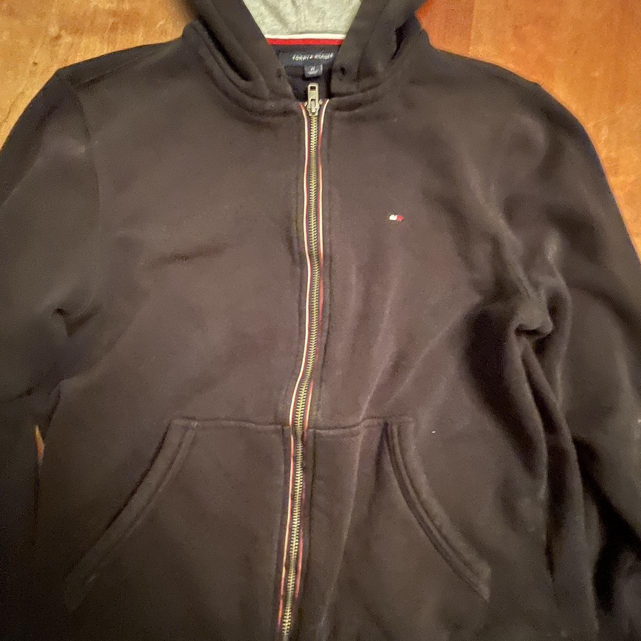 Black Tommy Hilfiger zip up hoodie. Used but still... - Depop