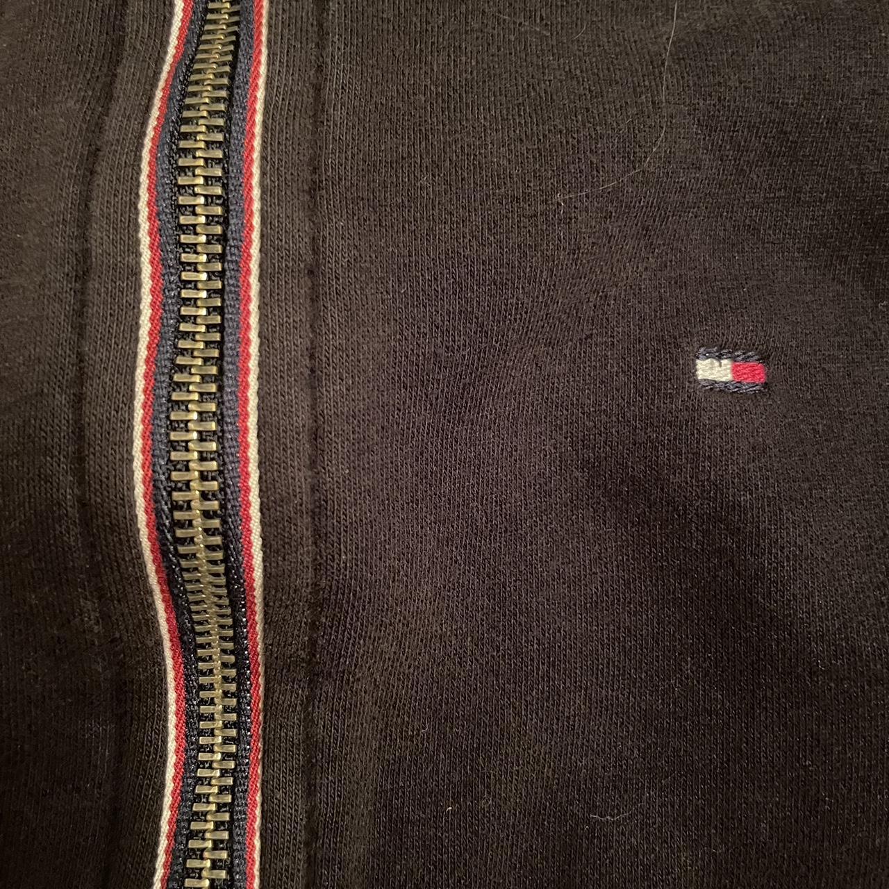 Black Tommy Hilfiger zip up hoodie. Used but still... - Depop