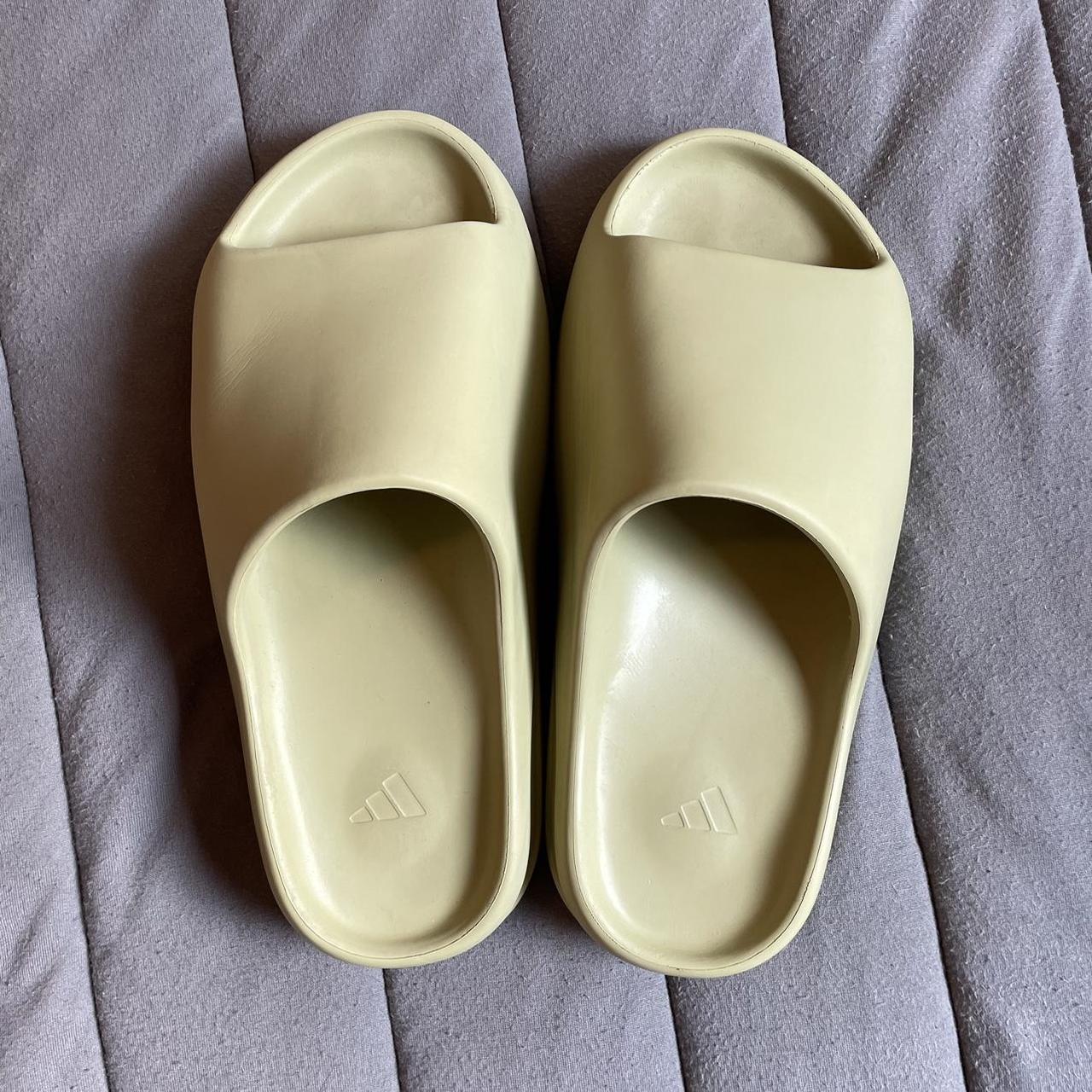 Yeezy slides in green. Size 9. Barely worn. No real... - Depop