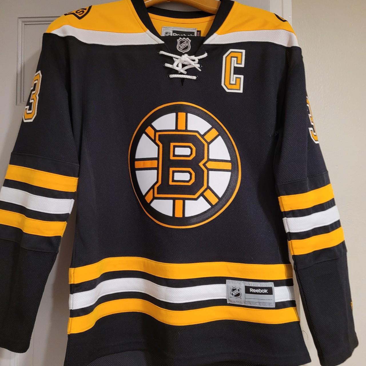 Reebok Chara #33 sports jersey. Small fabric snag... - Depop