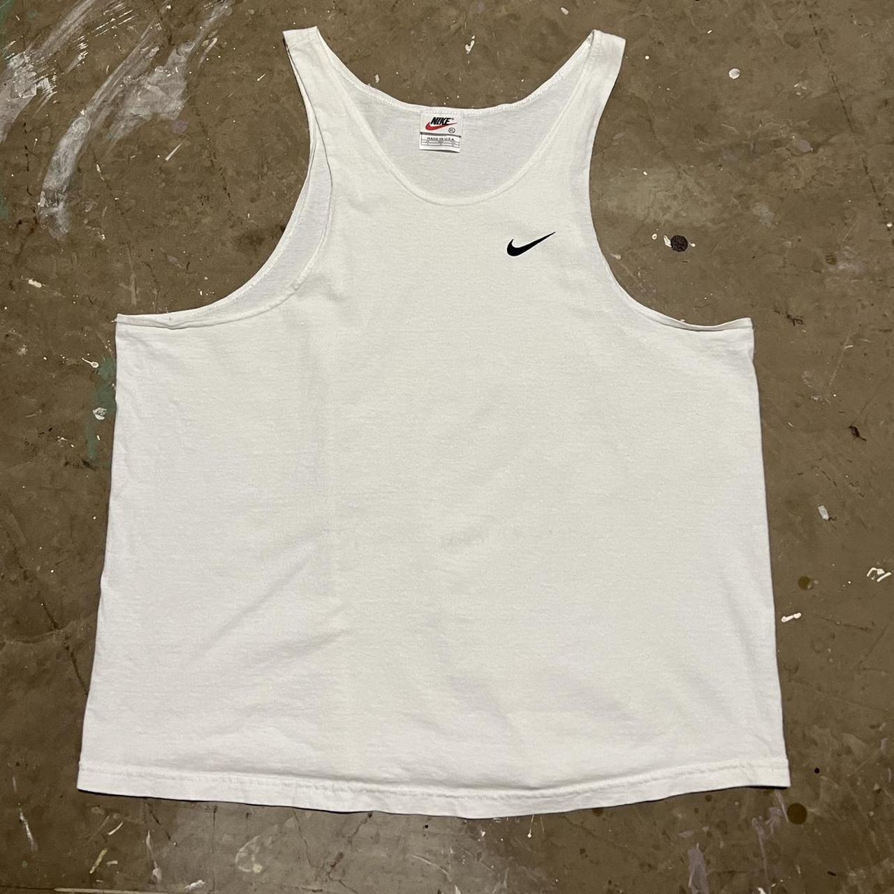 Nike tank top workout tank top with embroidered logo - Depop