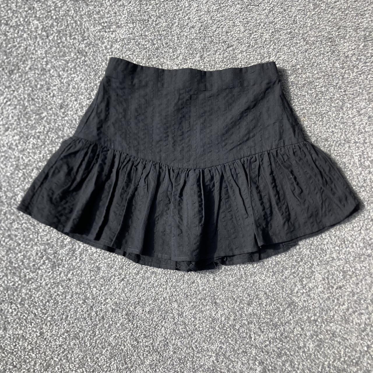 Black mini skirt with built in shorts... - Depop