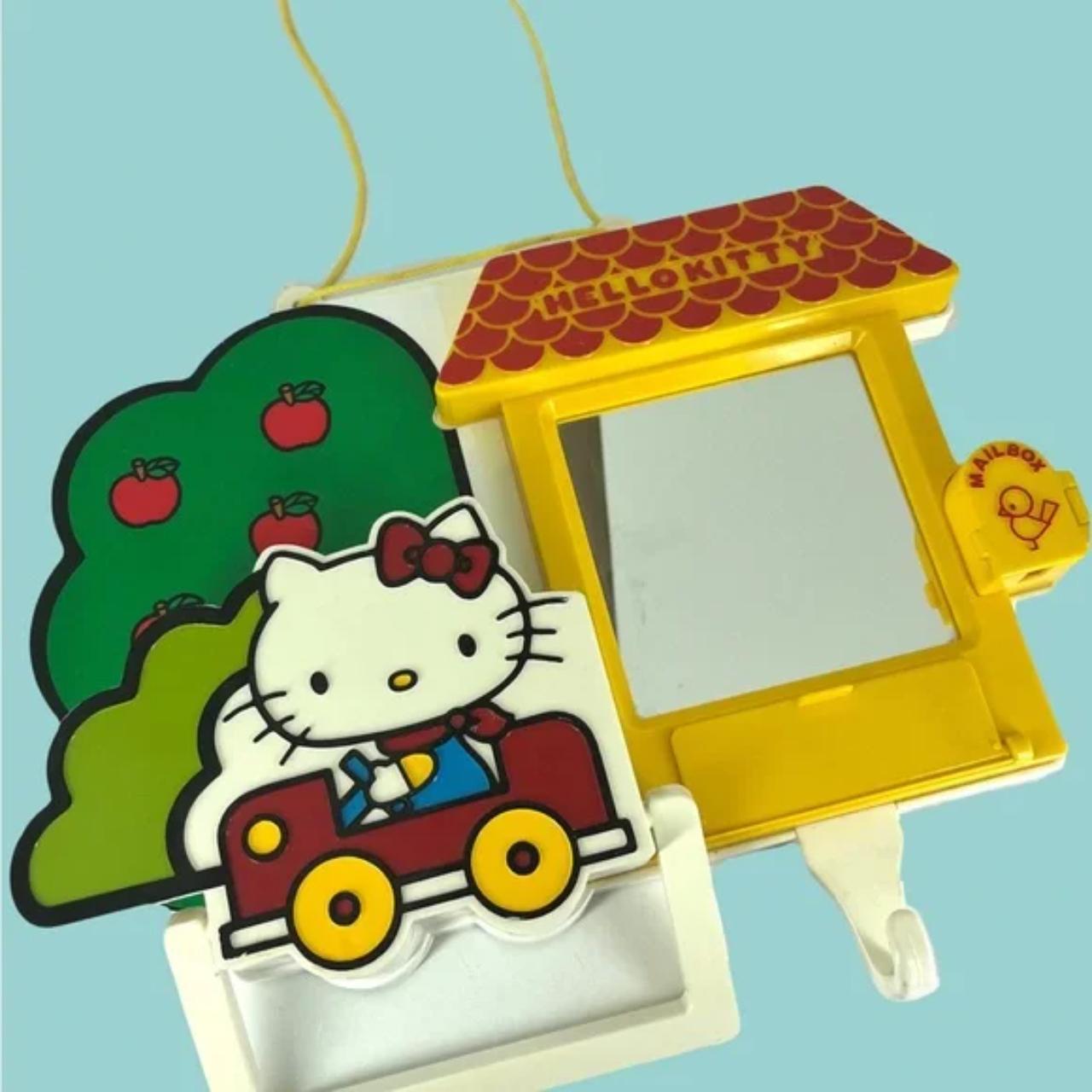 Vintage deals 1976 Sanrio Hello Kitty plastic Towel Rack