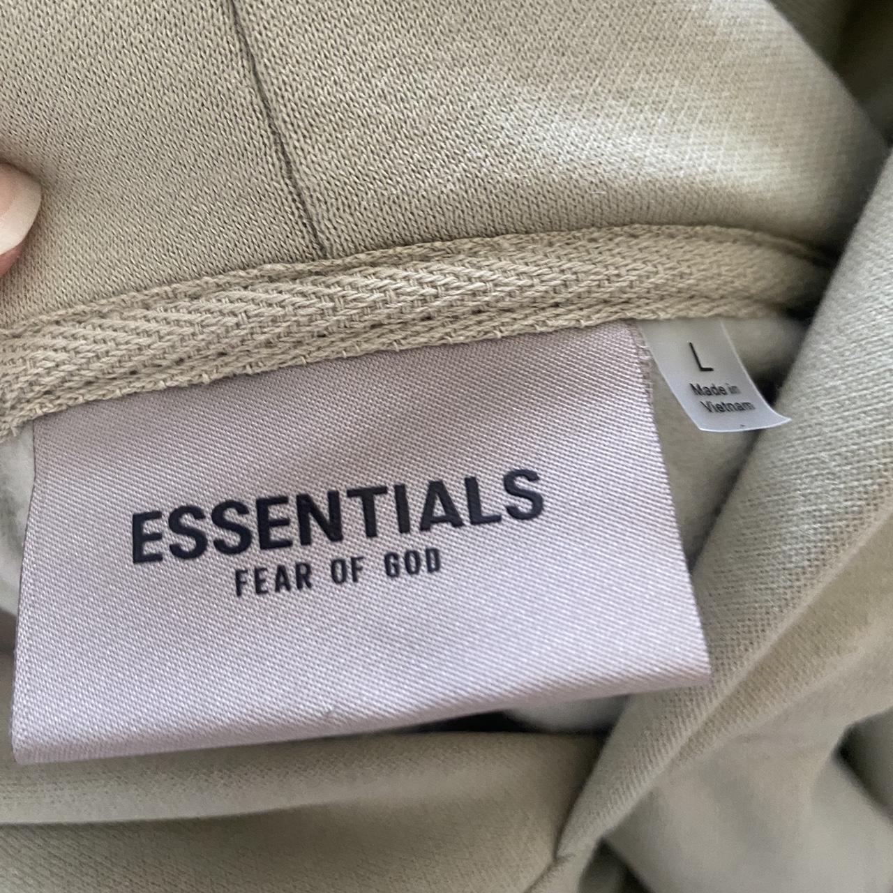 Greenish Essentials hoodie sized a large very comfy... - Depop