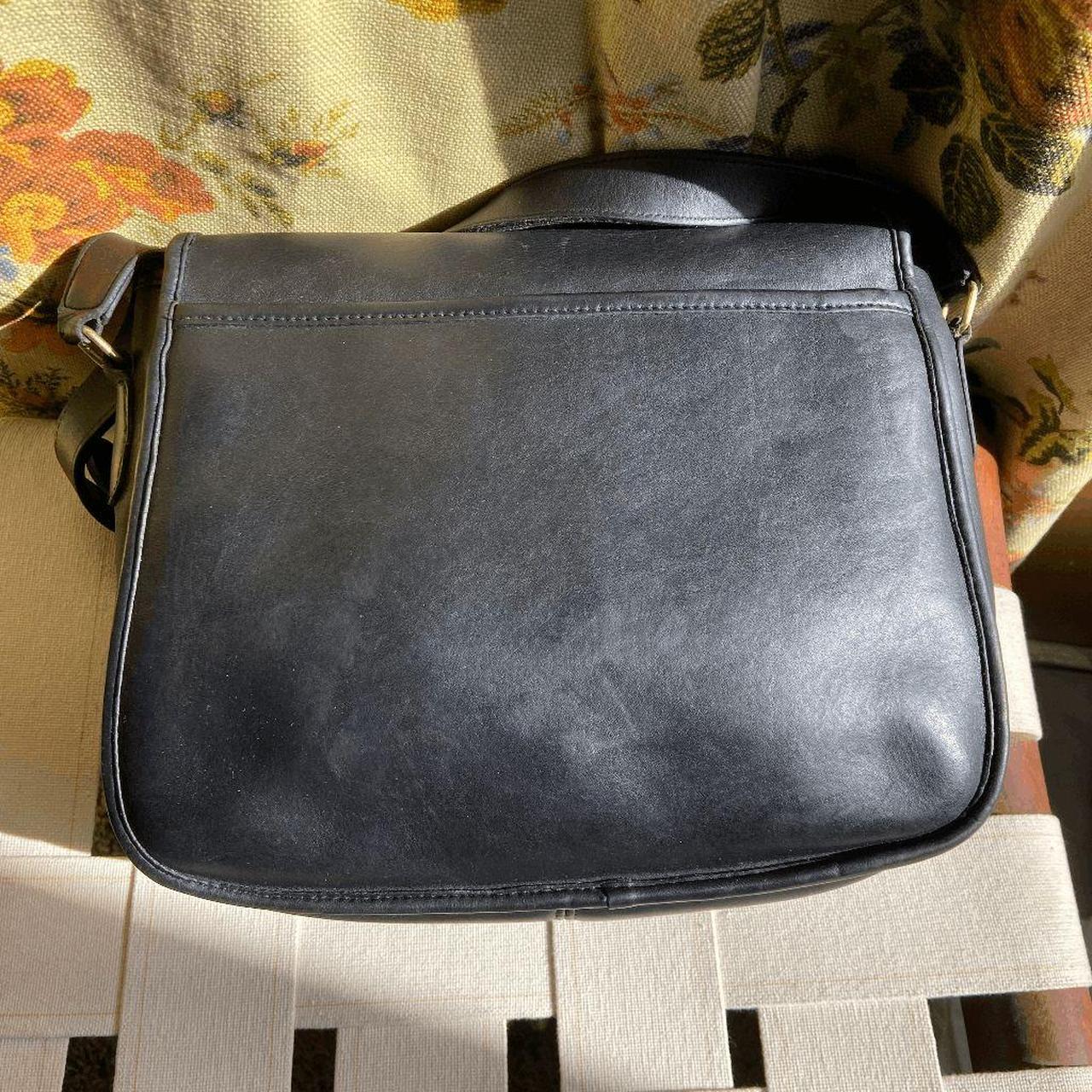 A dark navy blue cow leather Coach shoulder bag from - Depop