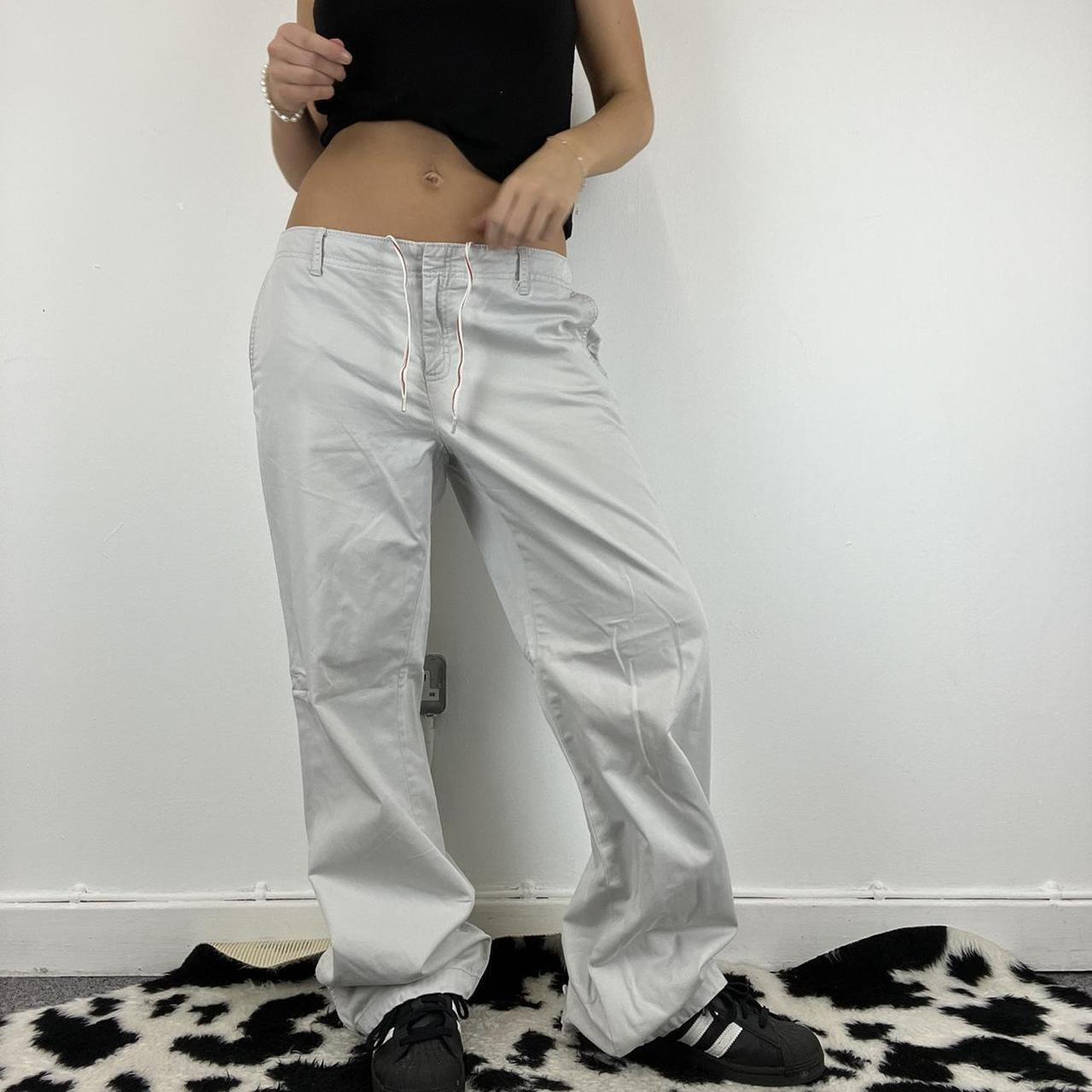 Low rise off white cargo pants, many pockets and - Depop