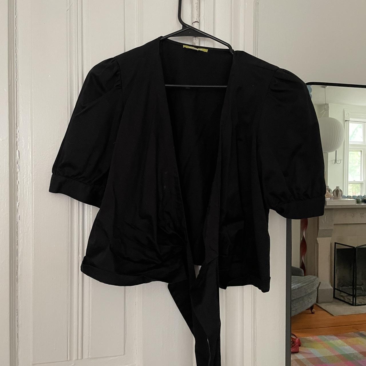 Gianni Bini black puff sleeve wrap top. In good... Depop