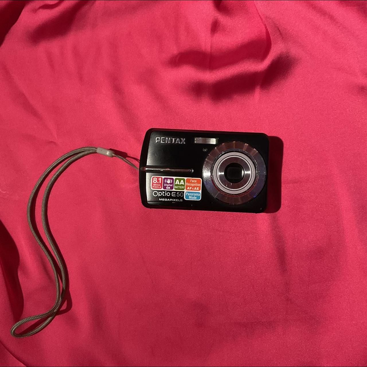 Black Pentax optio E50 digital camera in good... Depop