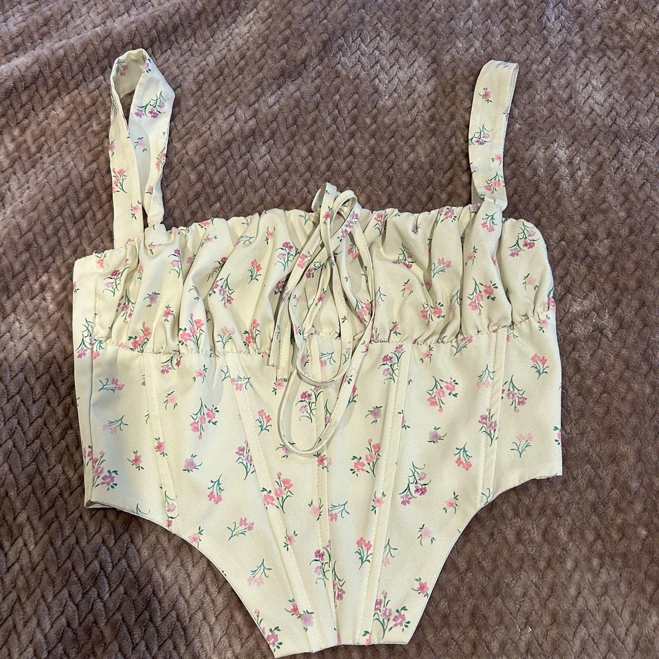 Yellow floral corset top size says medium fits more... Depop