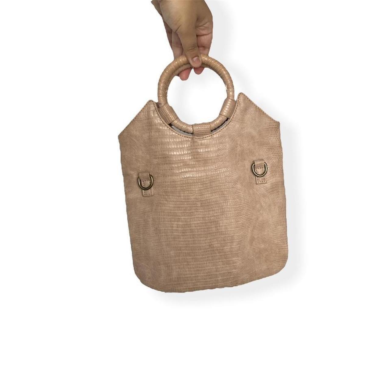 Beige nude bucket handbag from Anthropologie Has a Depop