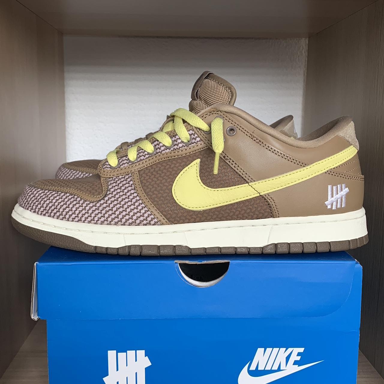 dunk low x undefeated resell price