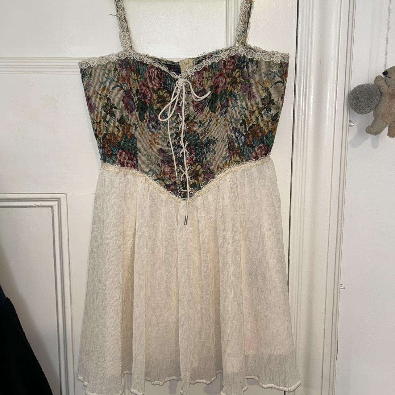 cider dress, zip up and not worn once, in good... Depop