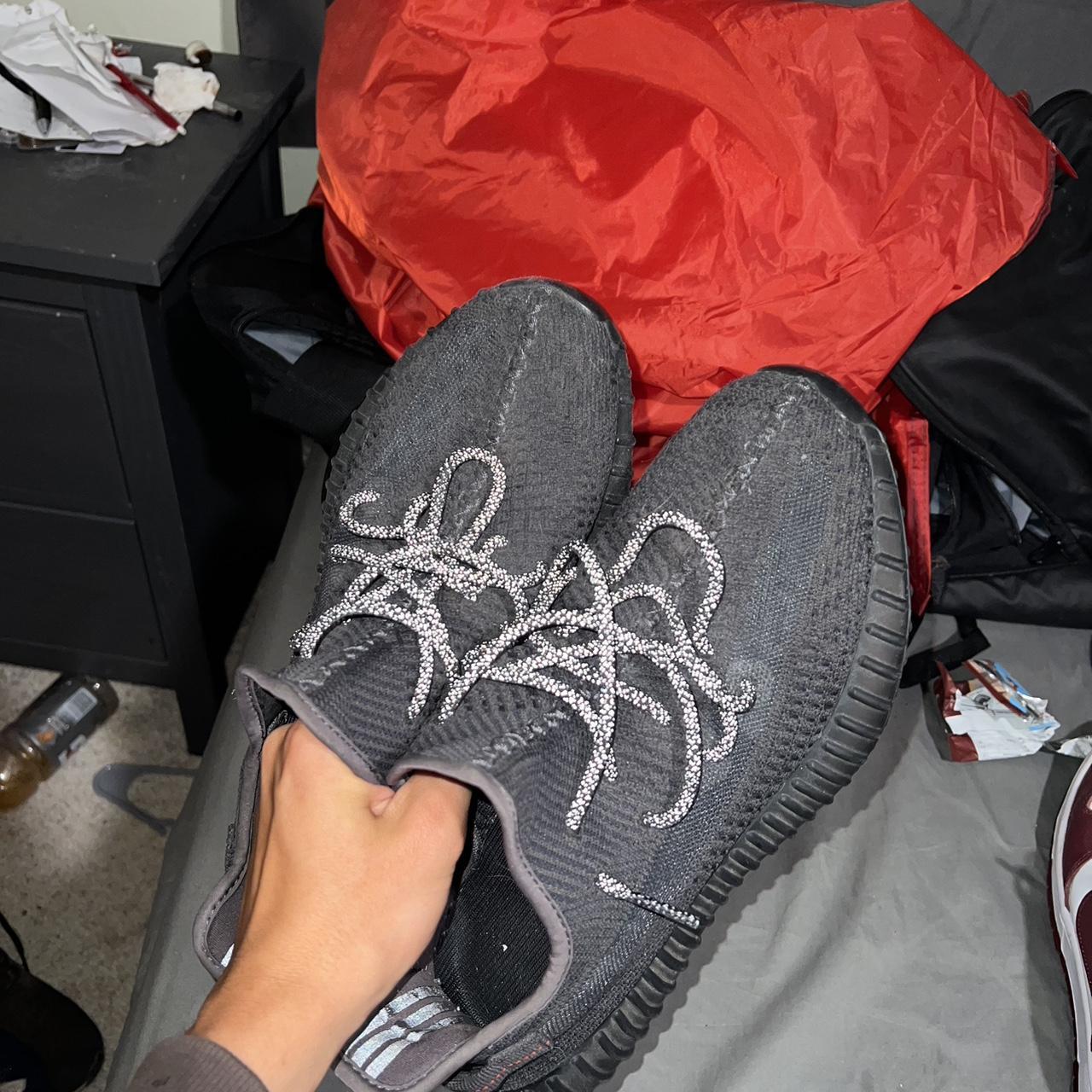 yeezy reflective black on feet