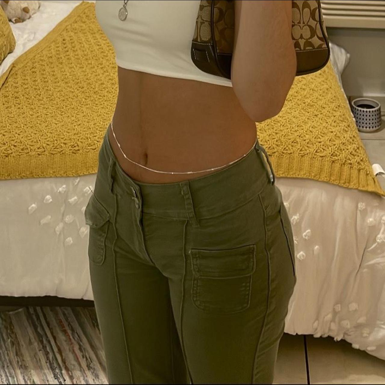 Green flare low rise pants Fits: XS I'm xs and 5'4... - Depop