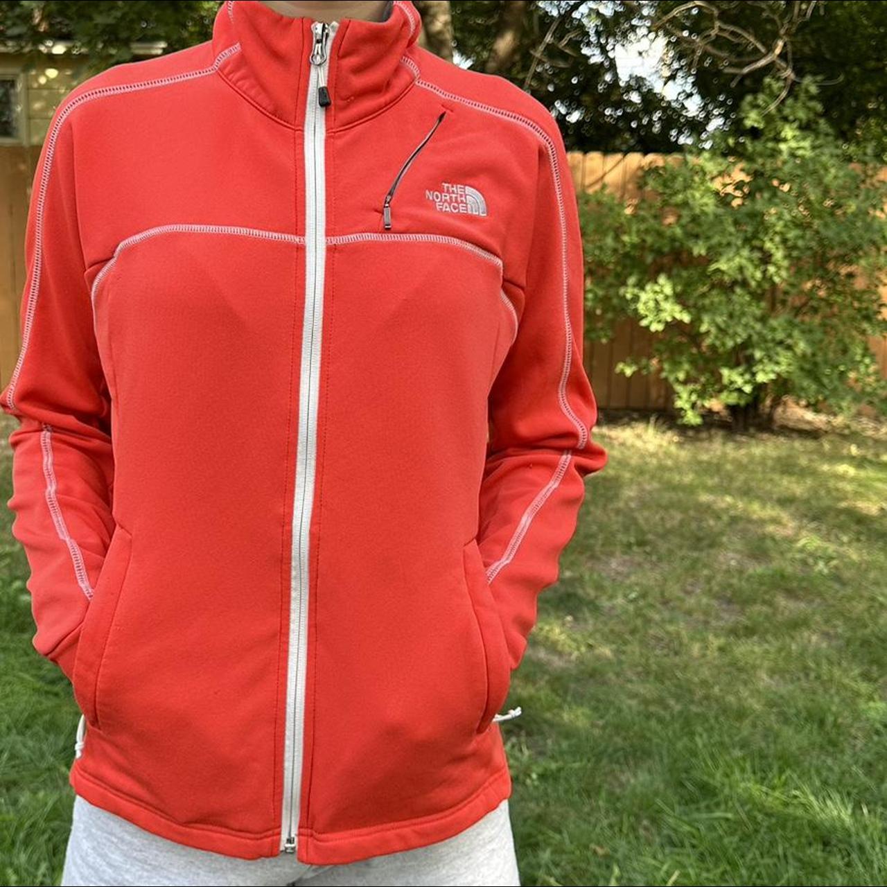 Ladies large North Face zip up, in a pretty coral,... - Depop