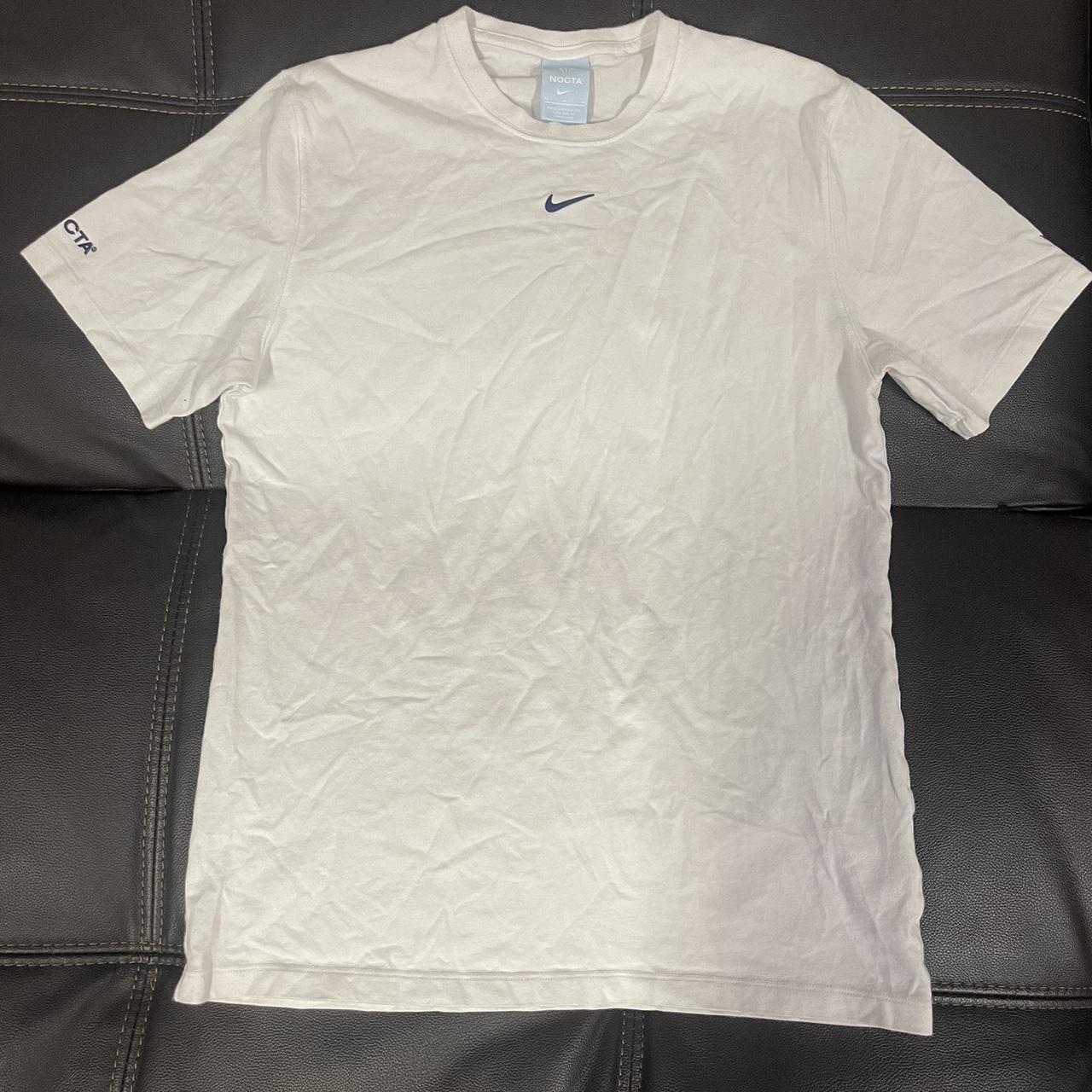 white nike men shirt