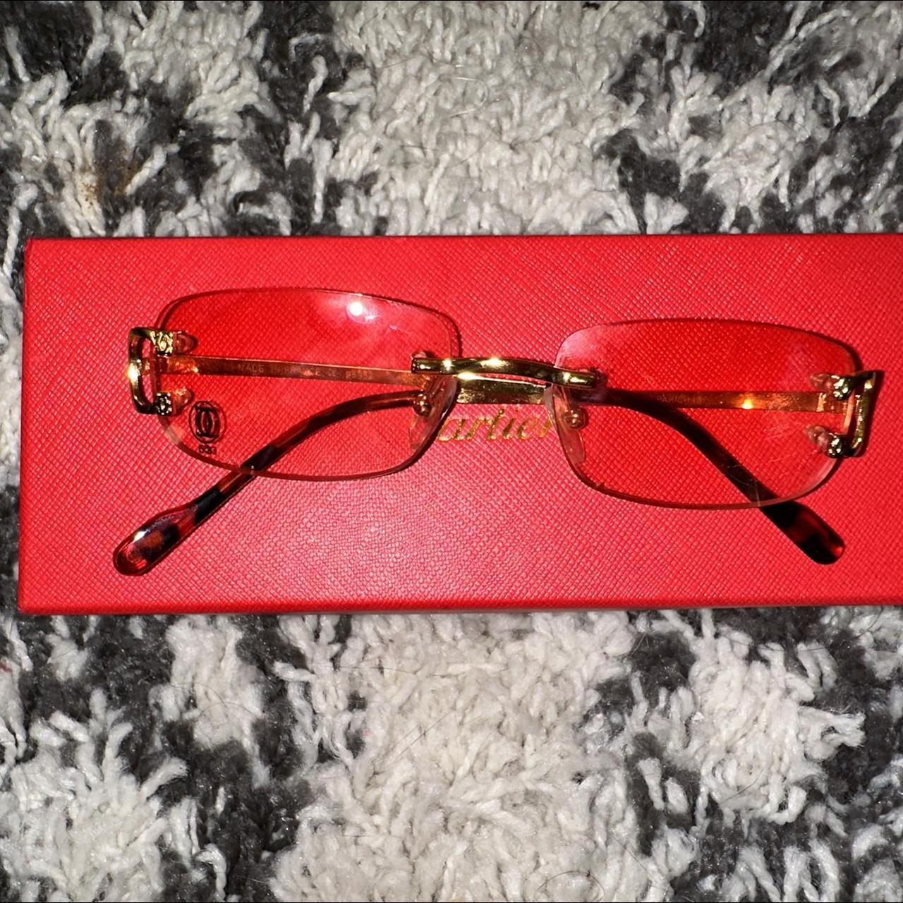 red lens cartier glasses