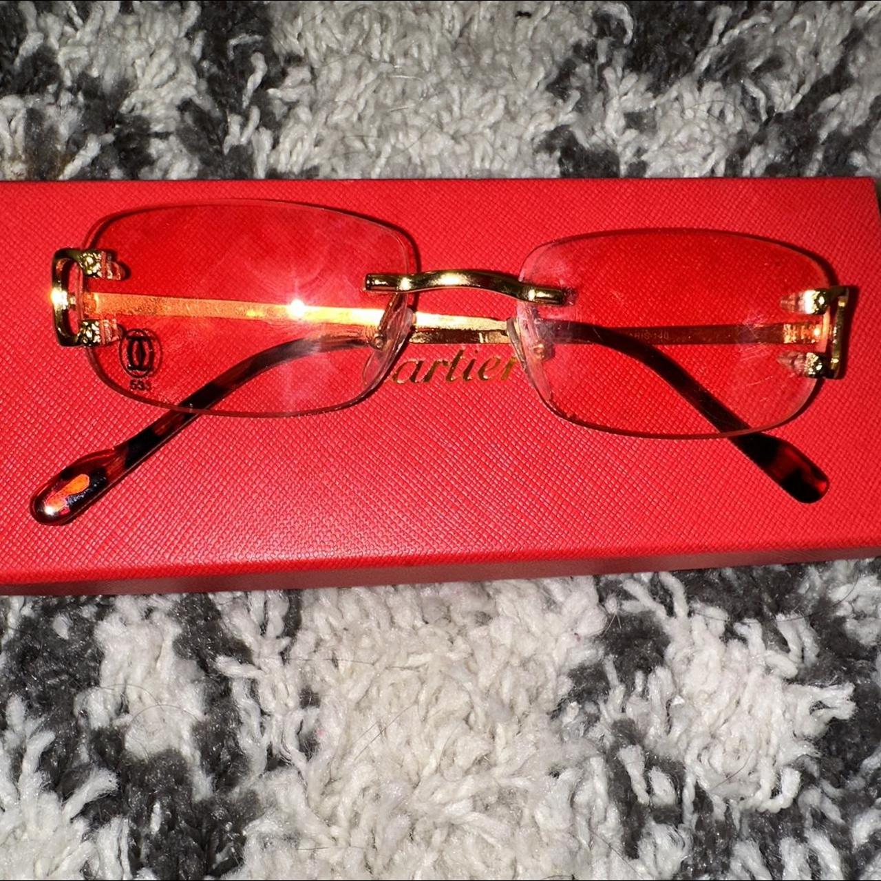 red lens cartier glasses