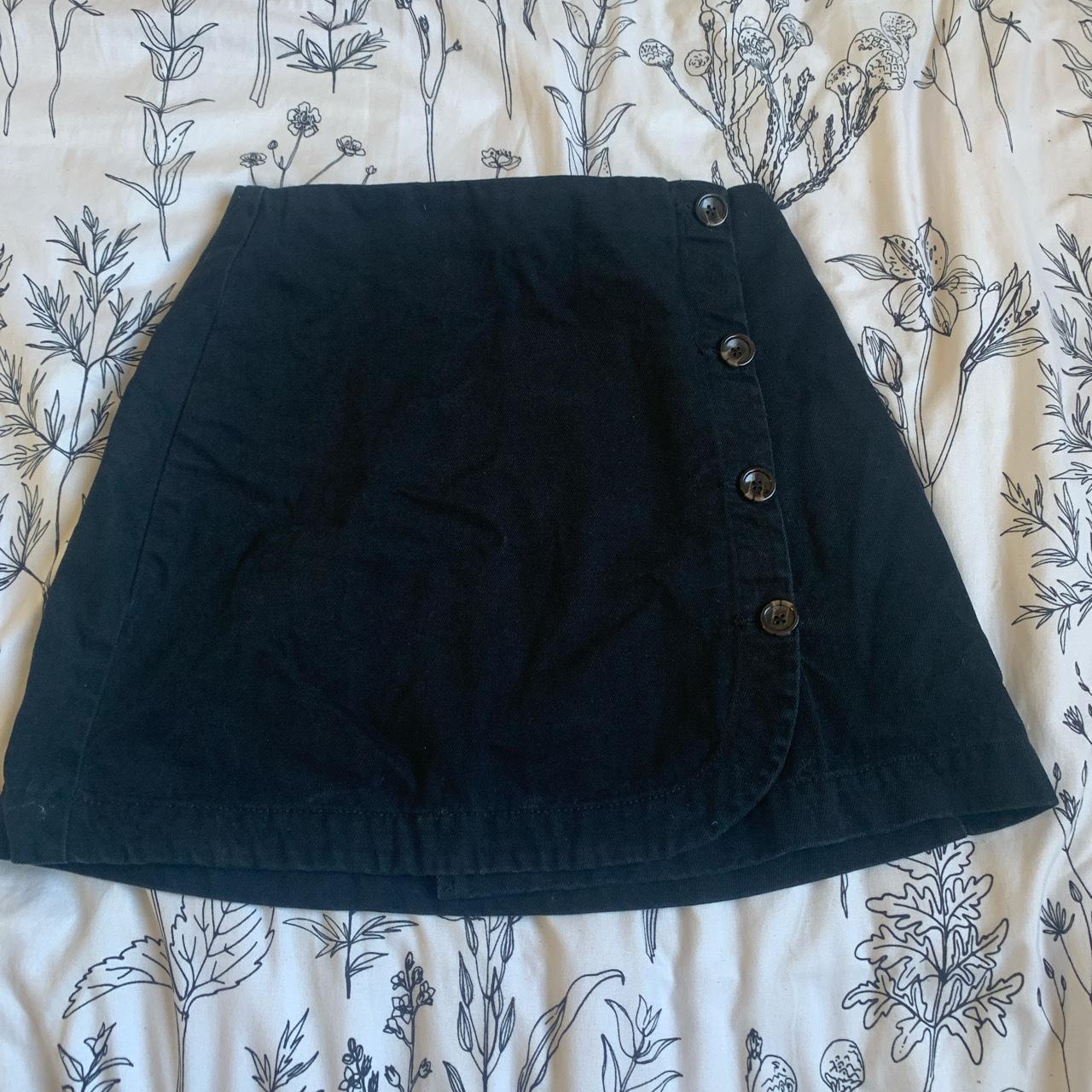 Small black skirt with buttons. Only worn once. - Depop