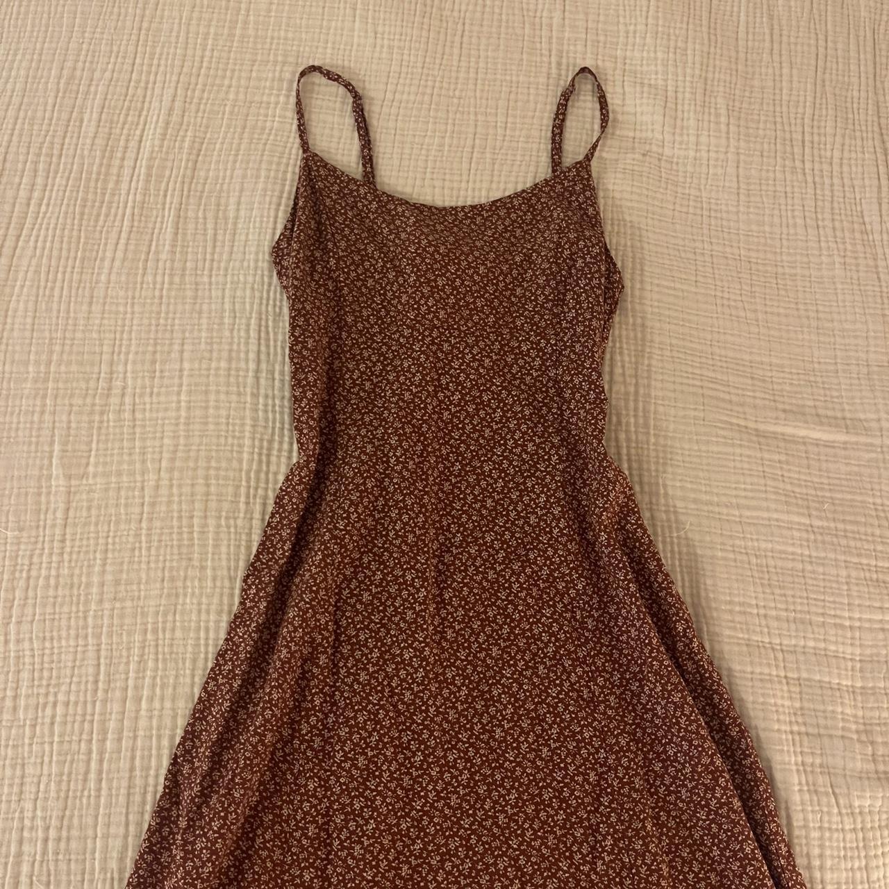 The brandy Melville red Colleen floral slip dress.... Depop