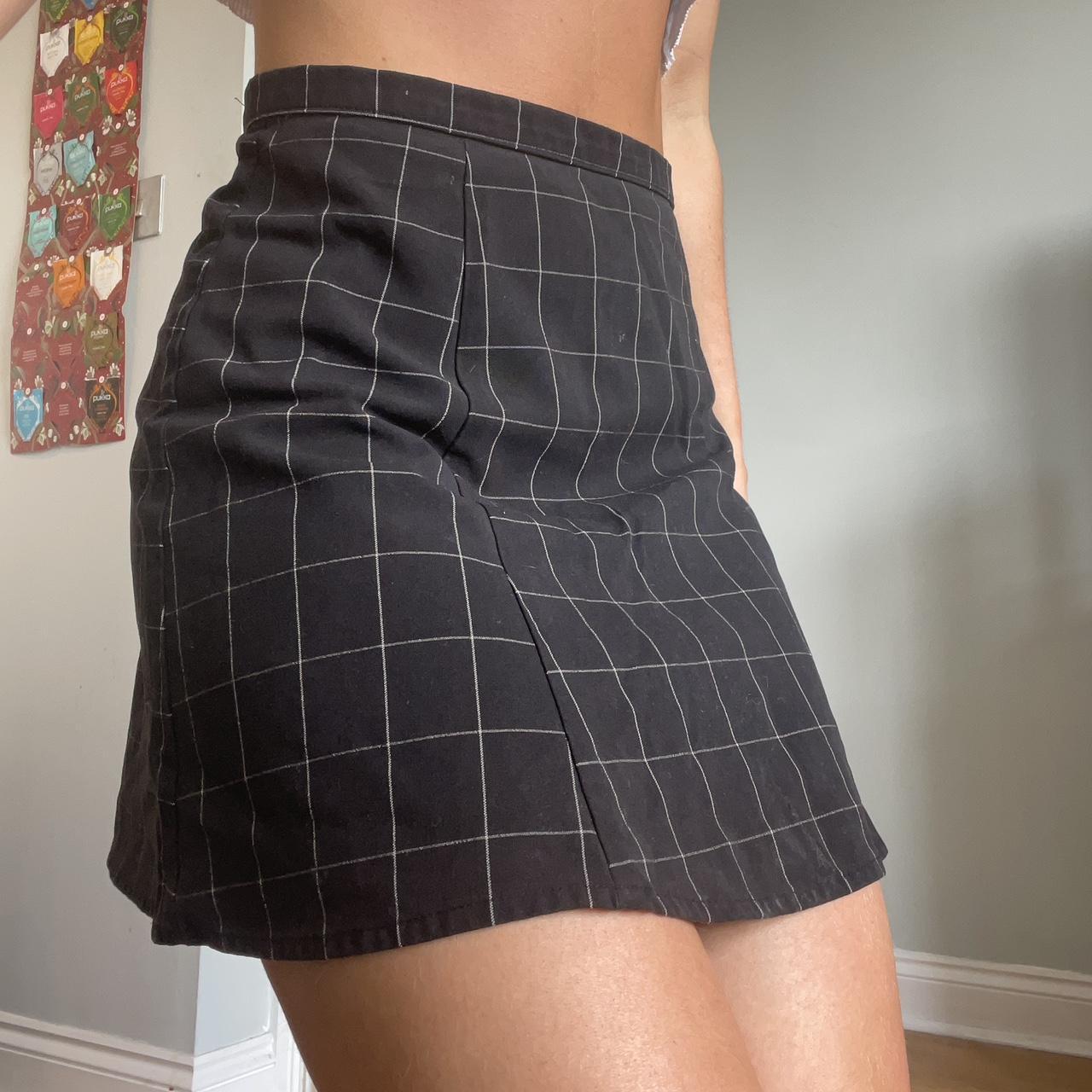 Black checkered UO miniskirt Good condition Open... Depop