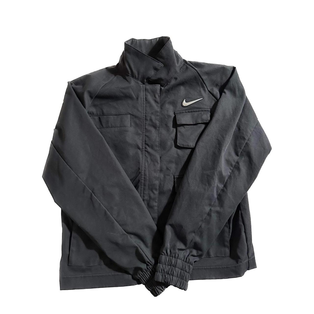 nike jacket that turns into a bag