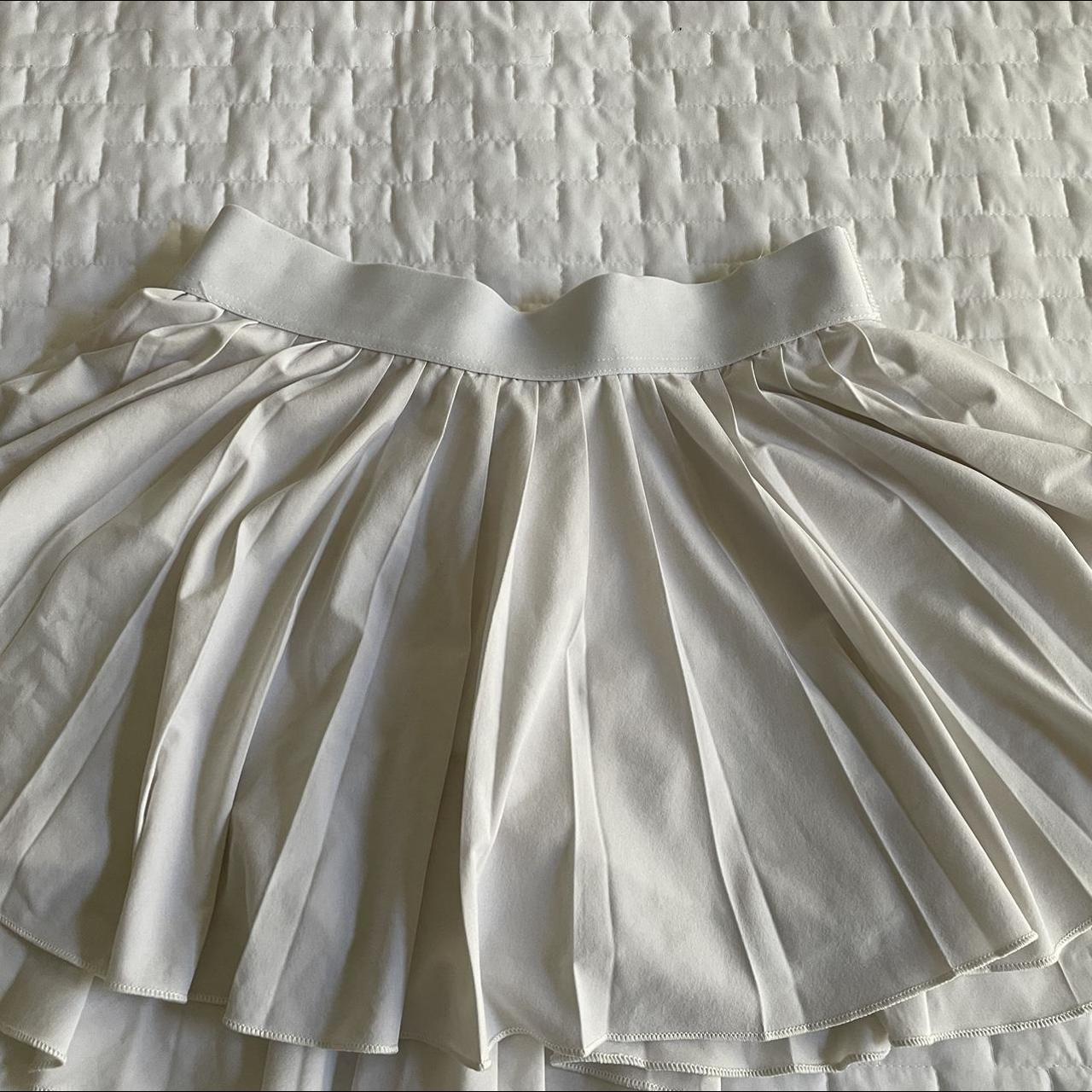 Aritzia TNA White Tennis shirt size M. Shorts... Depop
