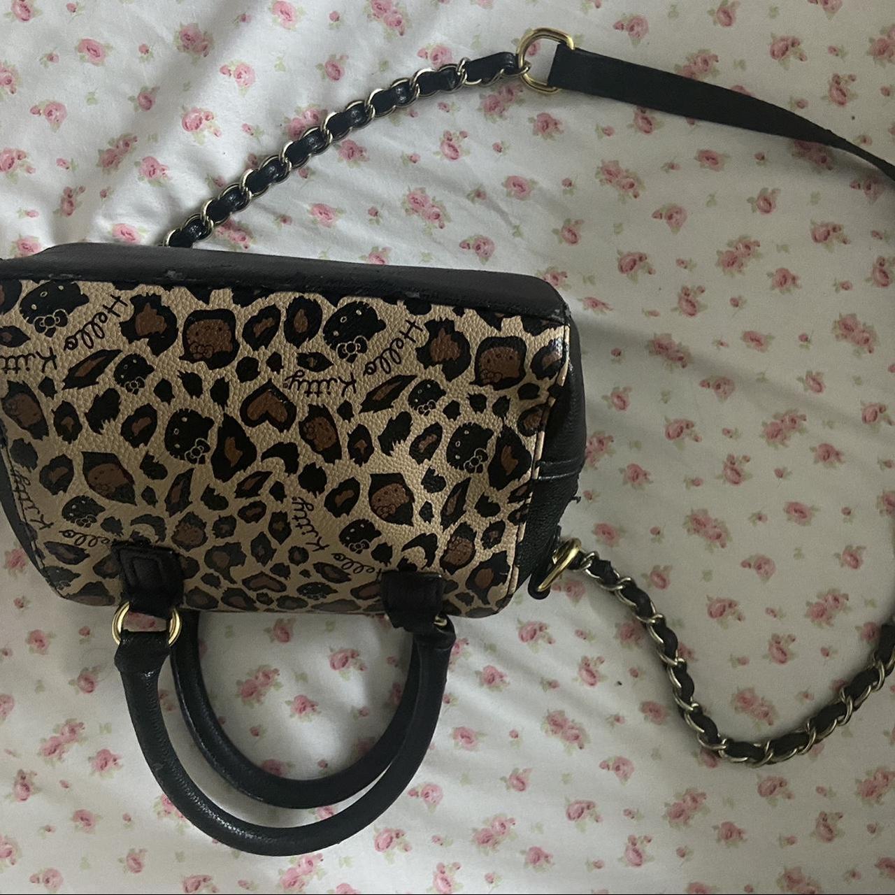 black hello kitty purse it is peeled up a bit in - Depop