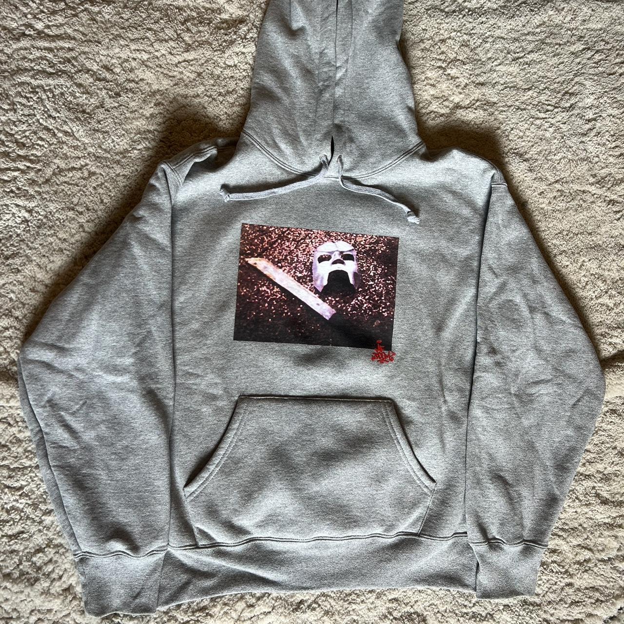 Supreme MF DOOM Hooded Sweatshirt (FW23) - $168