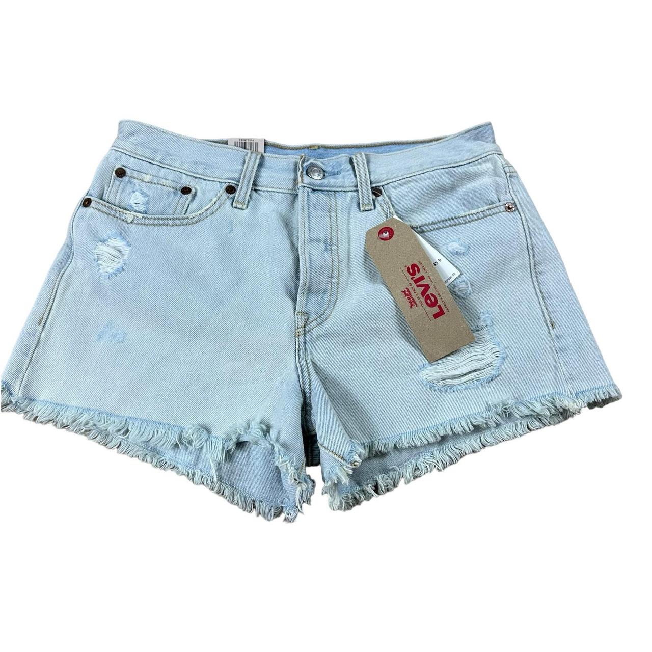 Light wash wedgie fit distressed denim shorts from