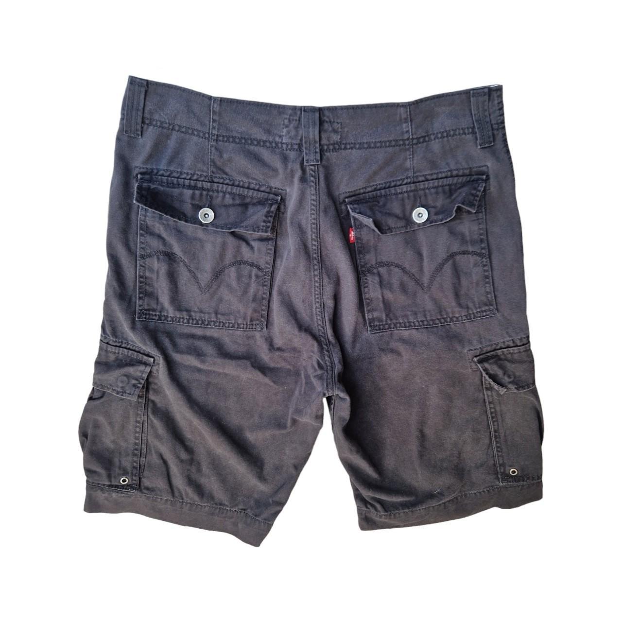 Vintage Levi's cargo shorts black 34" An unreal... Depop