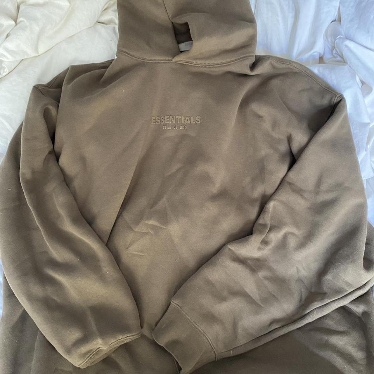 Fear of god essentials hoodie size hot sale