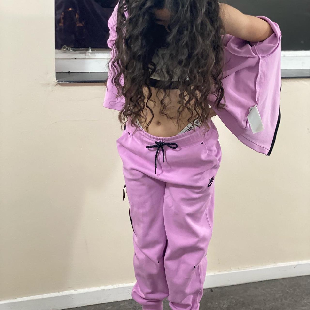 This is a pink nike tech tracksuit,which you can... - Depop