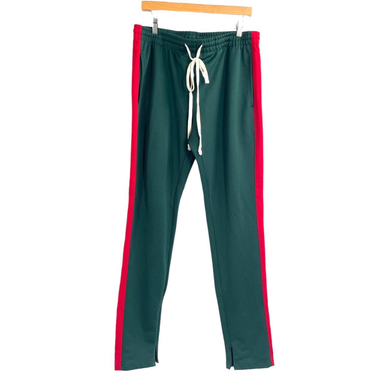 These green pull on track pants from EPTM feature a. Depop