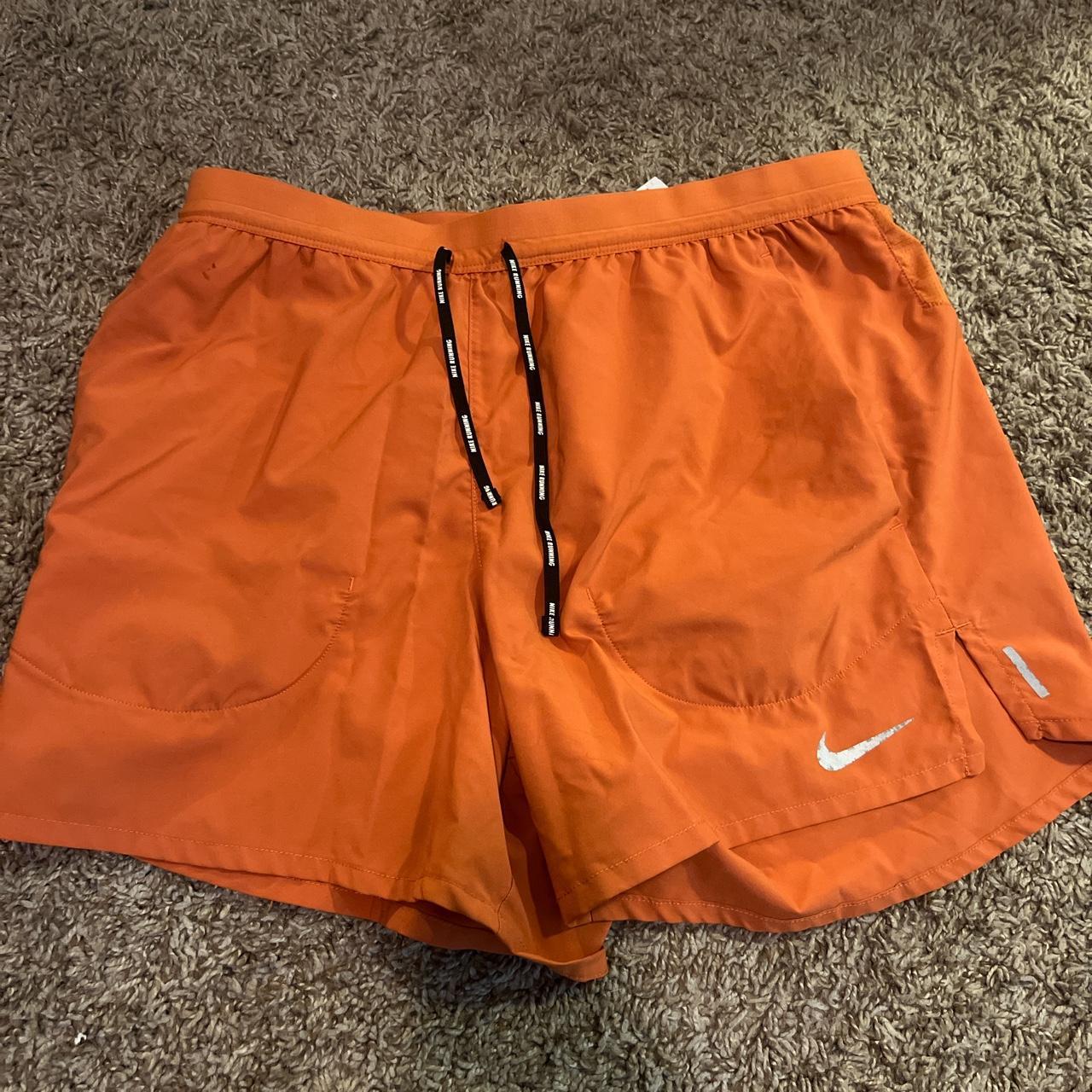 turf orange nike shorts