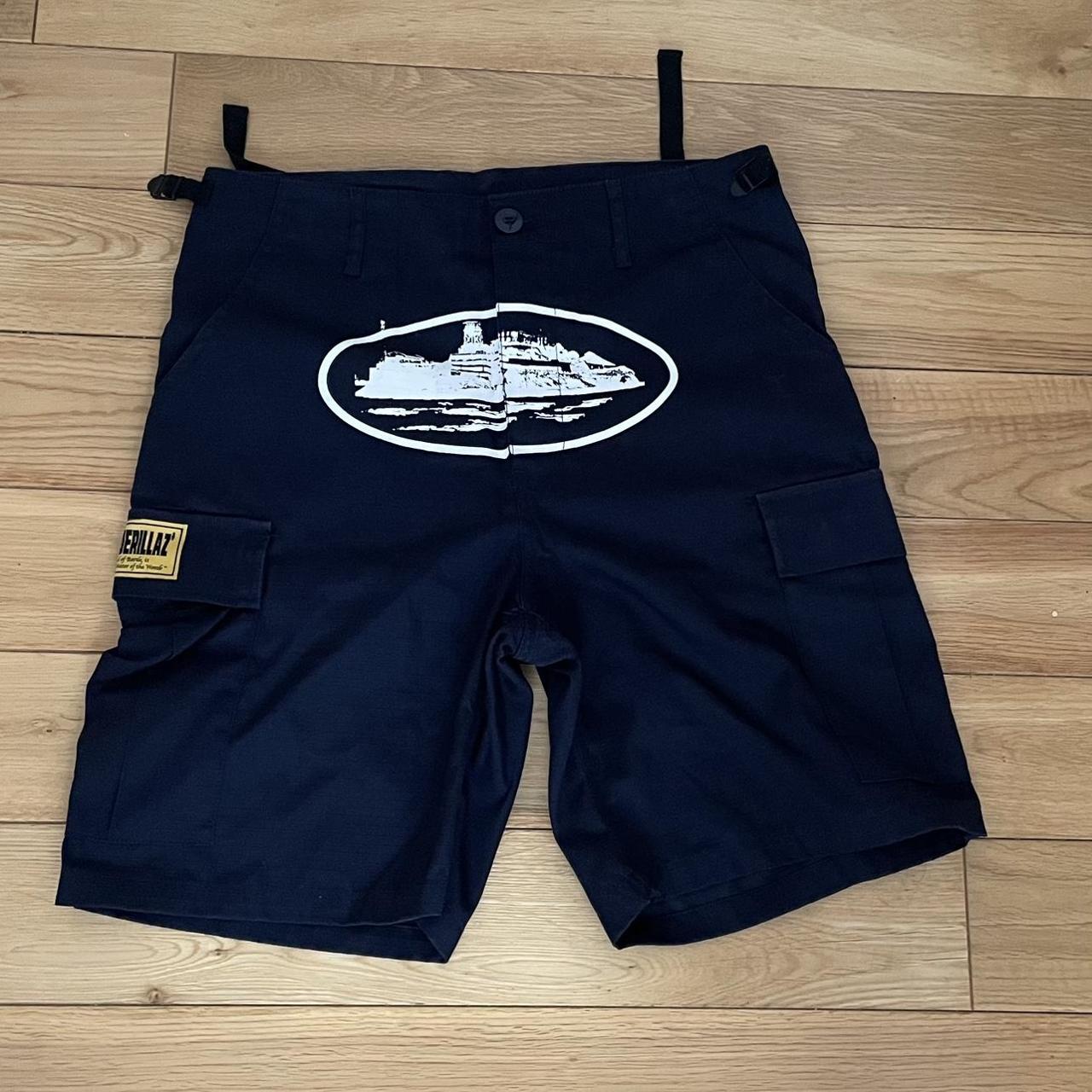 Corteiz navy guerillaz cargo shorts Size S Waist... - Depop