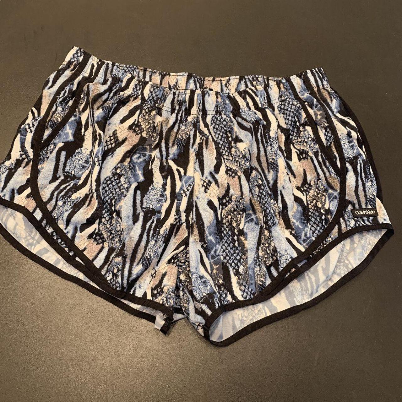 calvin klein snakeskin boots