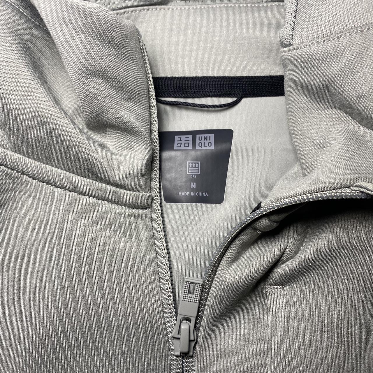 uniqlo grey sweater zip up jacket please use depop... Depop
