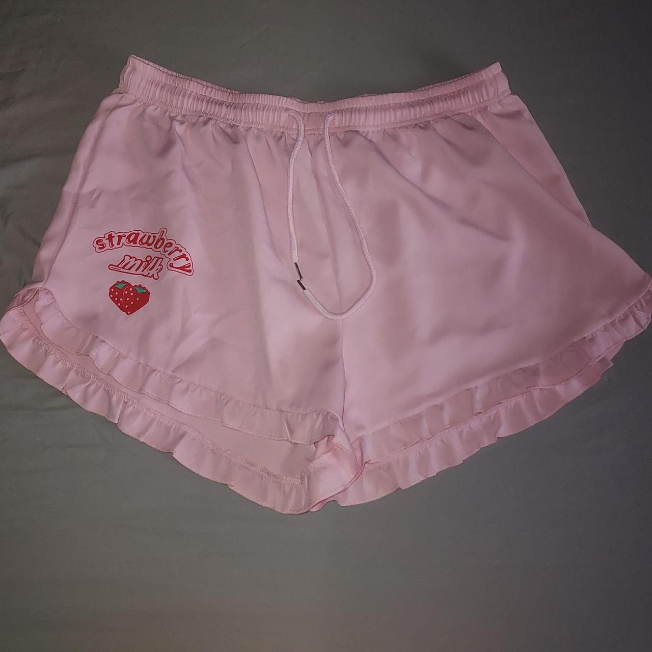 baby pink shorts with ruffled leg hems and a print... - Depop