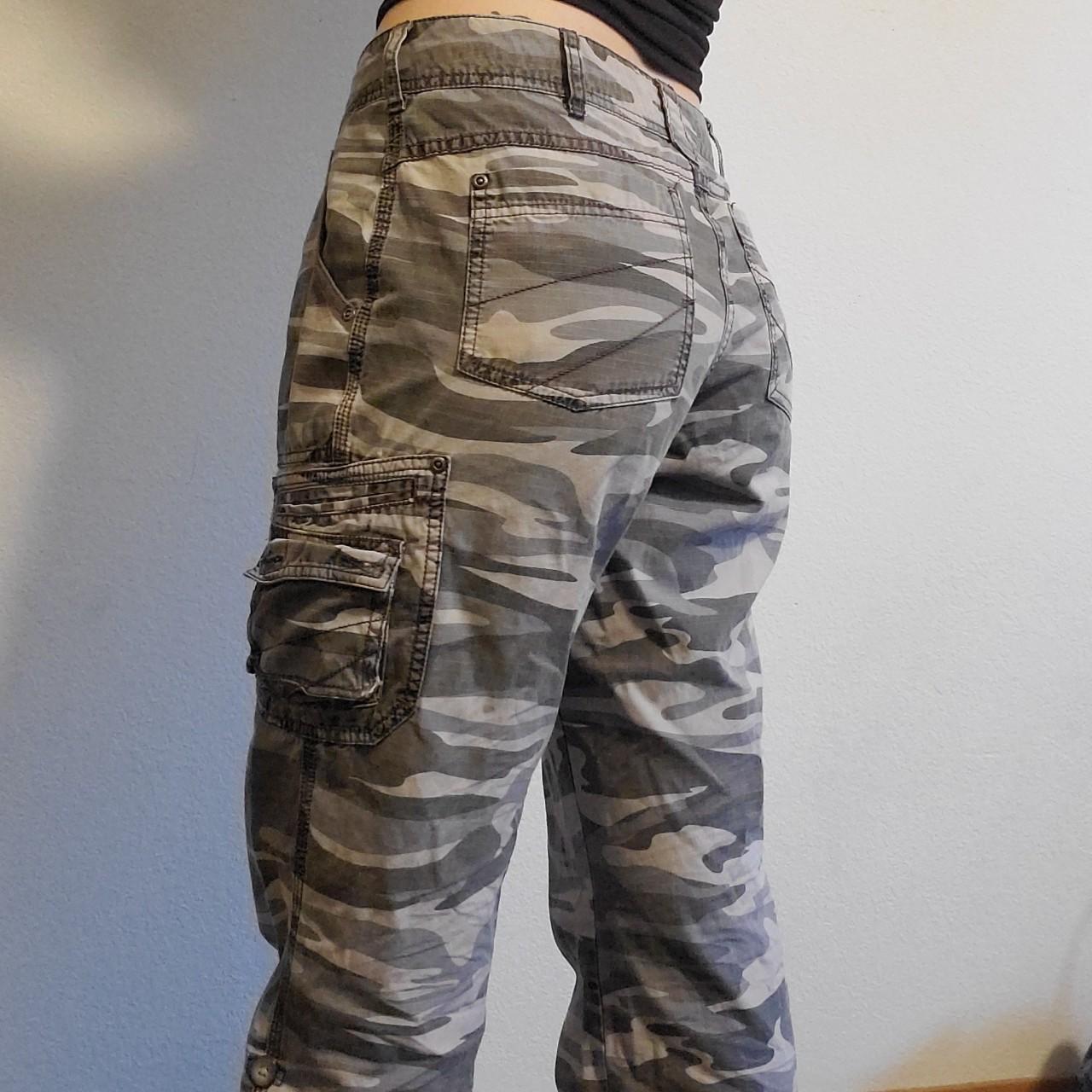 Grey camo cargo pants from Cabela's. Hugs nicely... Depop