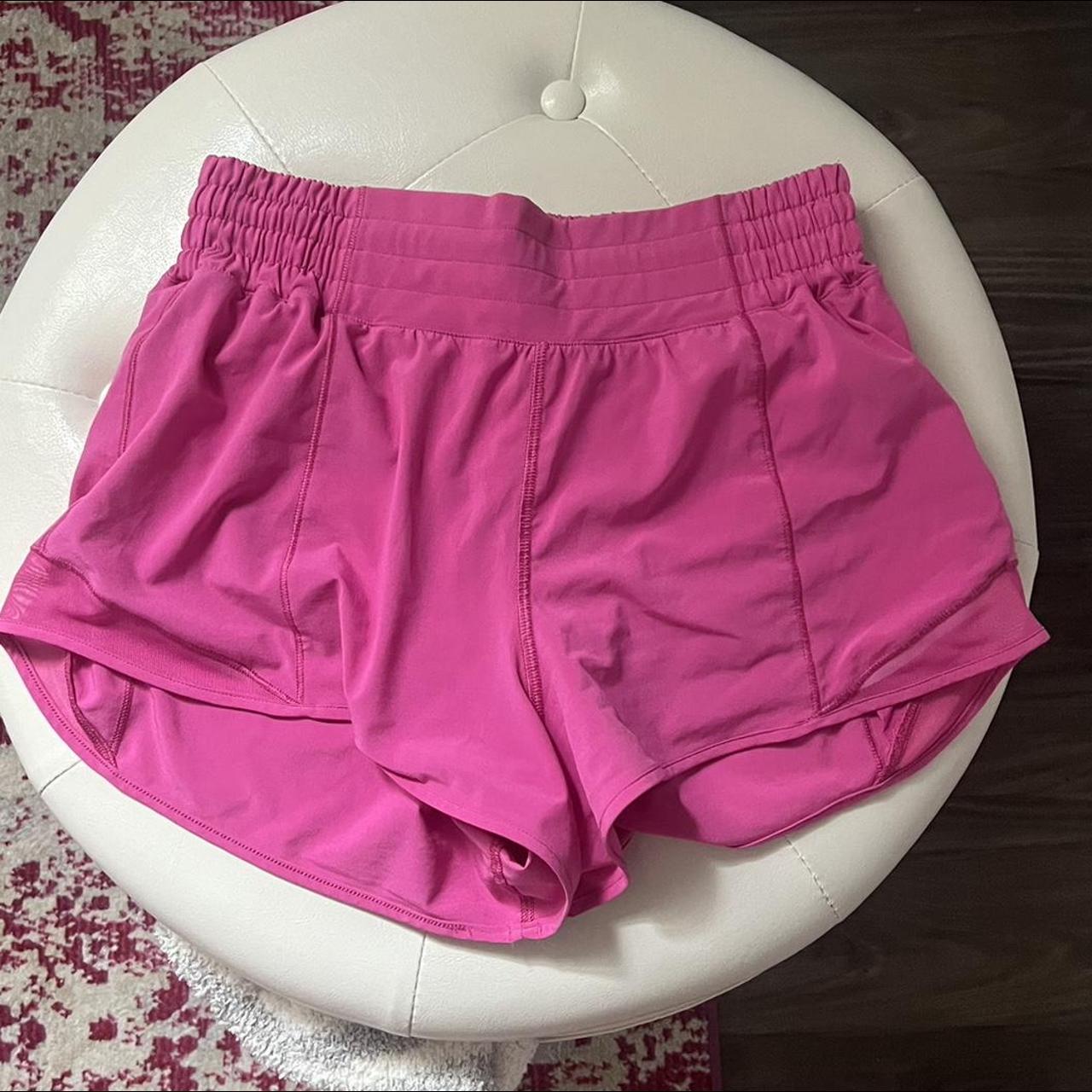 These are hot pink lulu lemon hotty hot shorts in a... - Depop