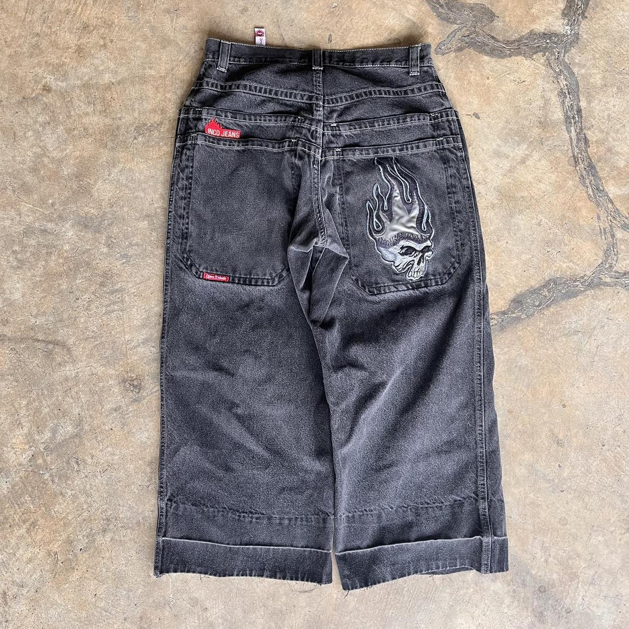 JNCO Flaming Skull Tribals Size 34x32 buy measure to... - Depop