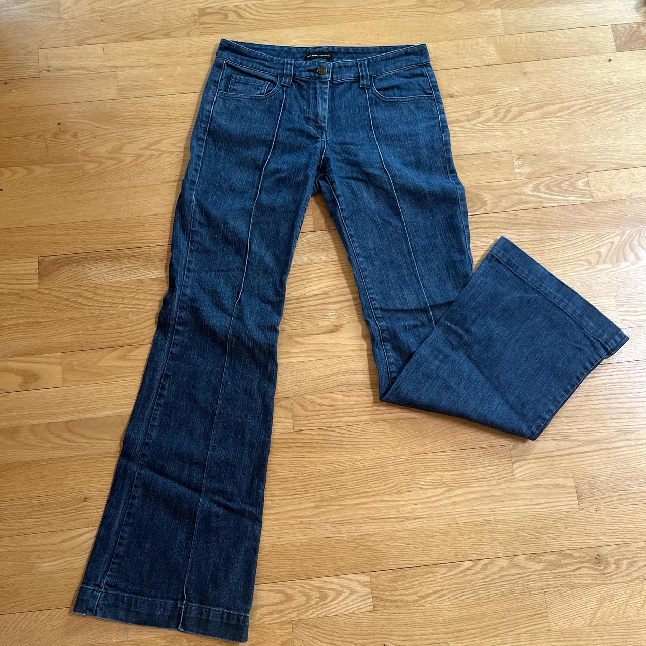 very low rise navy flare jeans with sewed in line on... Depop